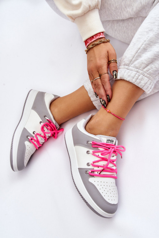 Modelo clássico de calçado desportivo com atacadores Branco-cinza Jella