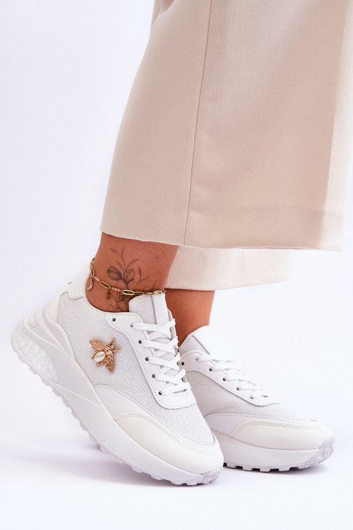 Calçados esportivos brilhantes com enfeites na cor branca Seneca