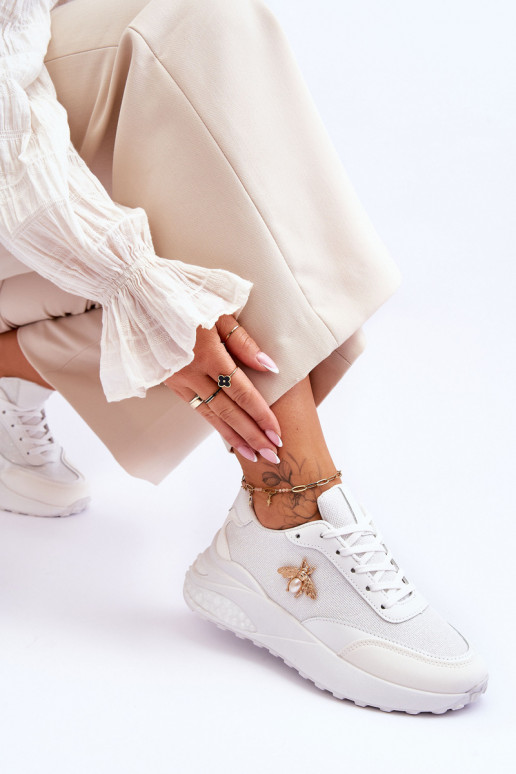 Calçados esportivos brilhantes com enfeites na cor branca Seneca