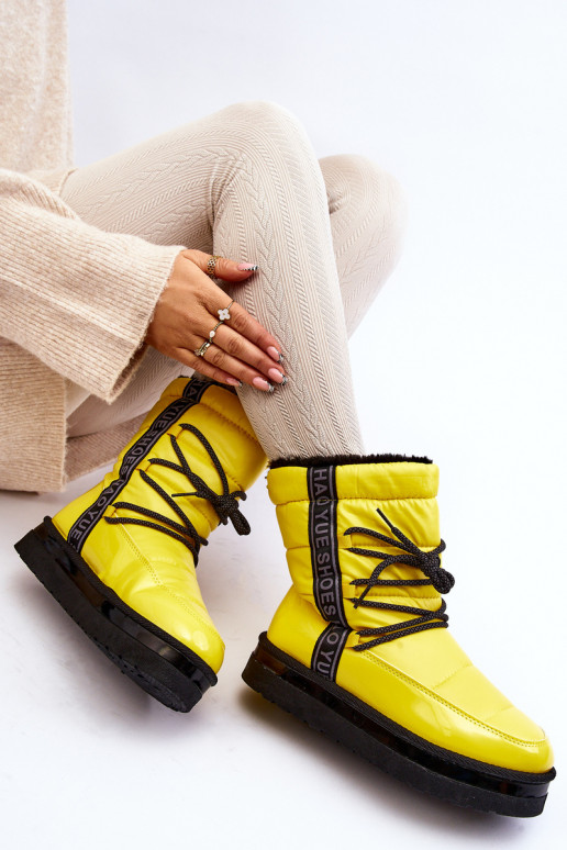 botas de neve com detalhes elegantes em amarelo Lilara botas de neve com detalhes elegantes em amarelo Lilara