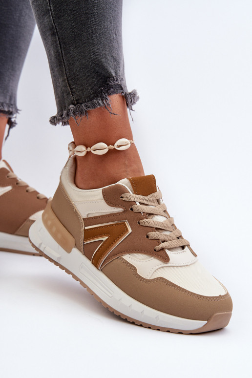 Modelo de tênis calçado confeccionado em couro ecológico cor marrom Vinelli