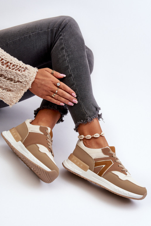 Modelo de tênis calçado confeccionado em couro ecológico cor marrom Vinelli