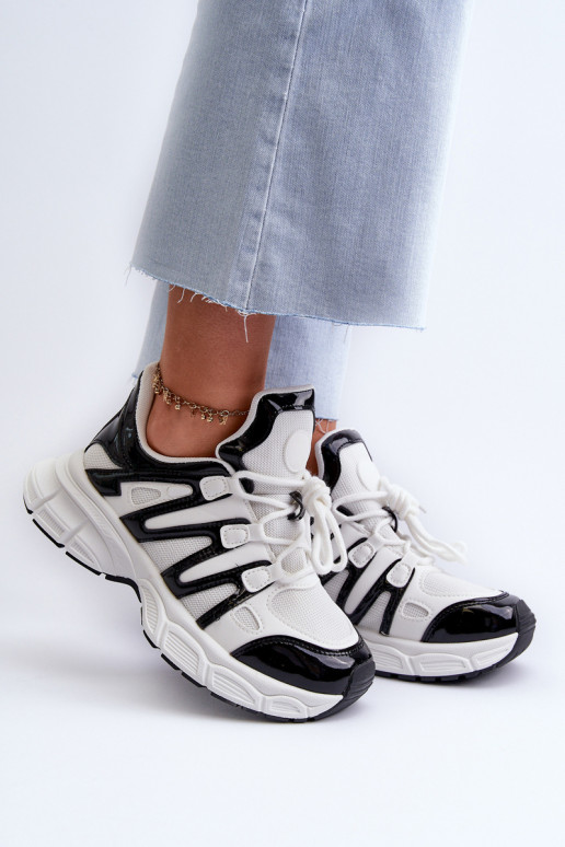 Tênis modelo sapatos branco-preto cor Ahmani