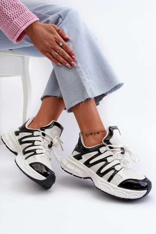 Tênis modelo sapatos branco-preto cor Ahmani