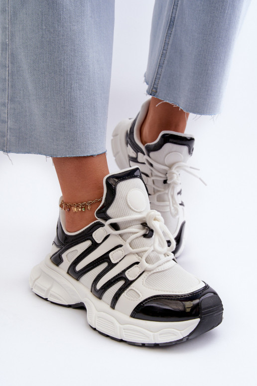 Tênis modelo sapatos branco-preto cor Ahmani