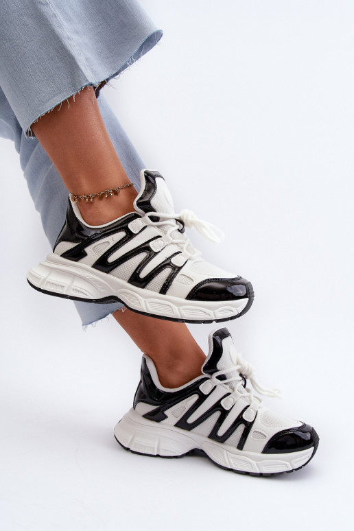 Tênis modelo sapatos branco-preto cor Ahmani