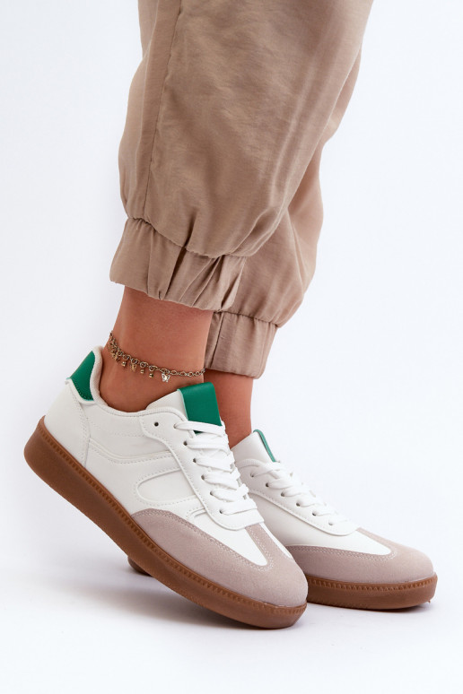 Modelo de tênis calçados esportivos cor branca Uvetta Modelo de tênis calçados esportivos cor branca Uvetta