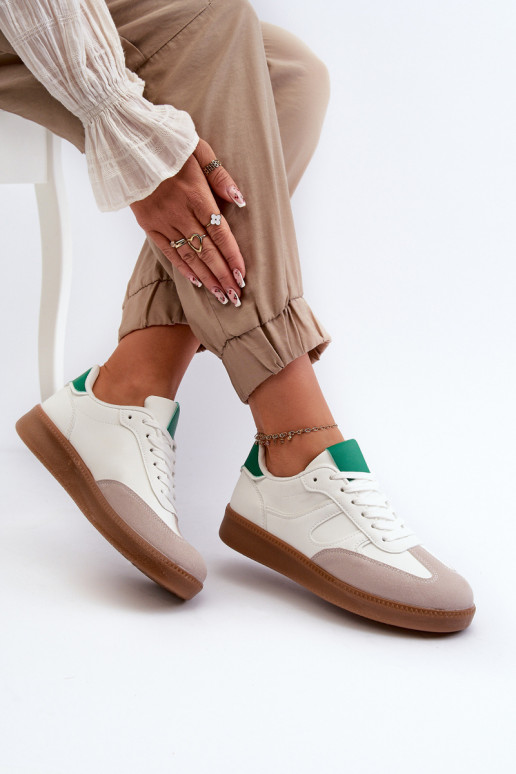 Modelo de tênis calçados esportivos cor branca Uvetta Modelo de tênis calçados esportivos cor branca Uvetta