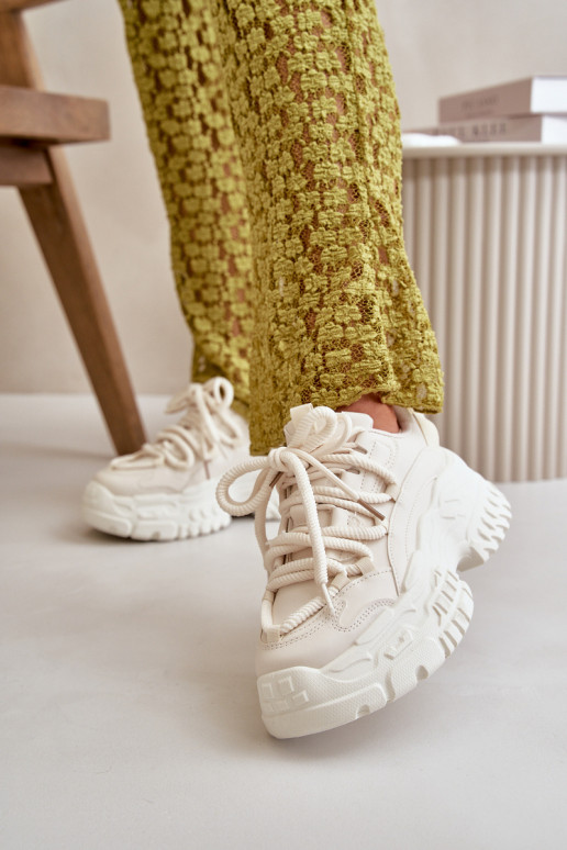 Modelo de tênis sapatos femininos com solas maciças da moda na cor marfim Nevela Modelo de tênis sapatos femininos com solas maciças da moda na cor marfim Nevela