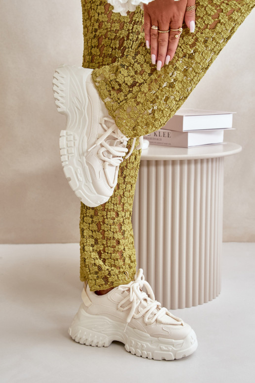 Modelo de tênis sapatos femininos com solas maciças da moda na cor marfim Nevela Modelo de tênis sapatos femininos com solas maciças da moda na cor marfim Nevela