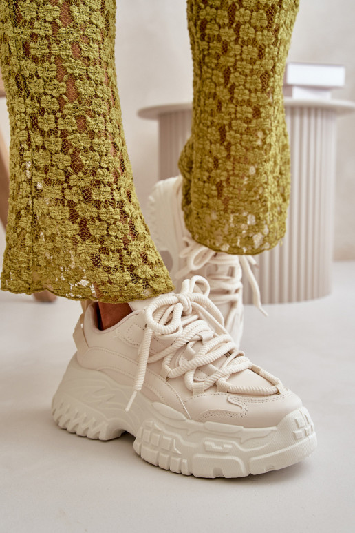 Modelo de tênis sapatos femininos com solas maciças da moda na cor marfim Nevela Modelo de tênis sapatos femininos com solas maciças da moda na cor marfim Nevela