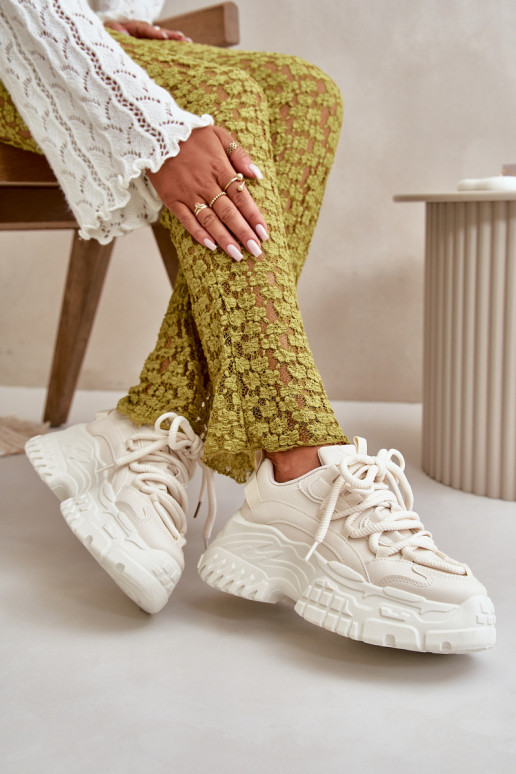 Modelo de tênis sapatos femininos com solas maciças da moda na cor marfim Nevela Modelo de tênis sapatos femininos com solas maciças da moda na cor marfim Nevela