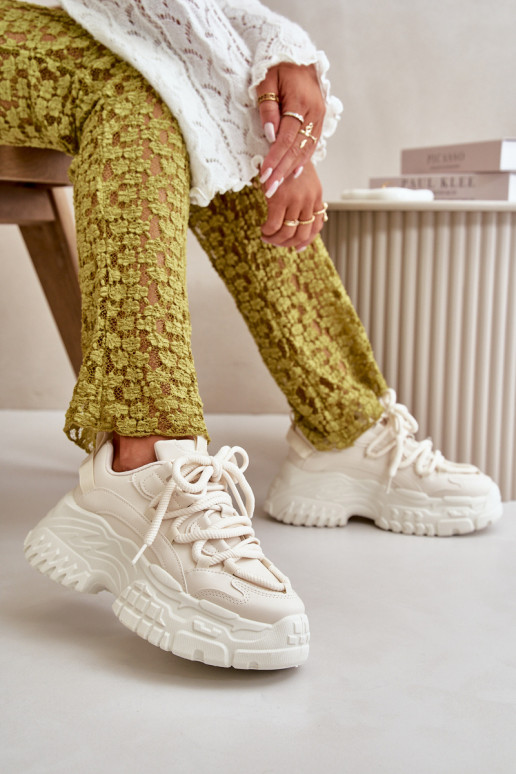 Modelo de tênis sapatos femininos com solas maciças da moda na cor marfim Nevela Modelo de tênis sapatos femininos com solas maciças da moda na cor marfim Nevela