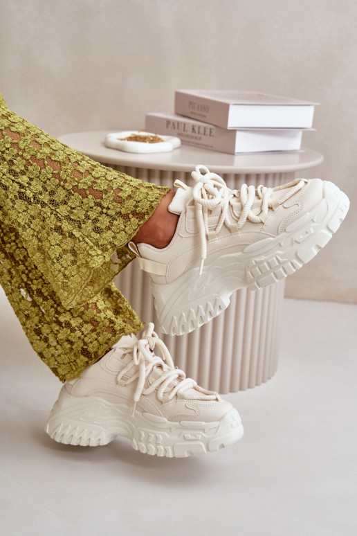 Modelo de tênis sapatos femininos com solas maciças da moda na cor marfim Nevela Modelo de tênis sapatos femininos com solas maciças da moda na cor marfim Nevela