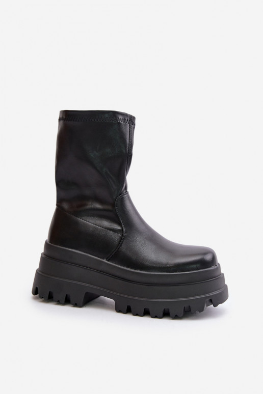 Botas com uma plataforma cor preta Florinara Botas com uma plataforma cor preta Florinara