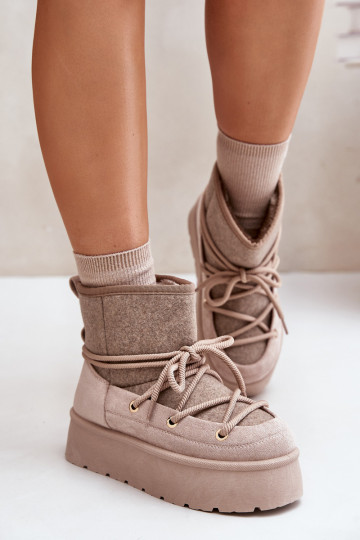 Botas de neve com pormenores de estilo e plataforma em bege 2