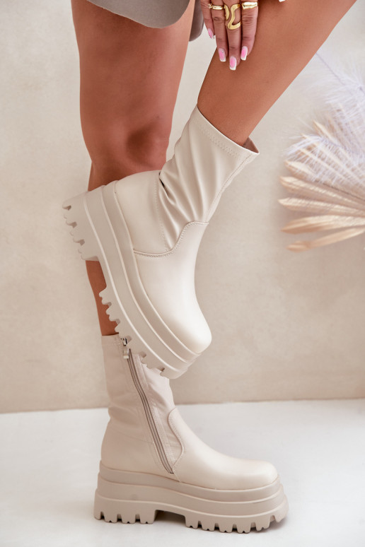 Botas com uma plataforma cor de marfim Florinara Botas com uma plataforma cor de marfim Florinara