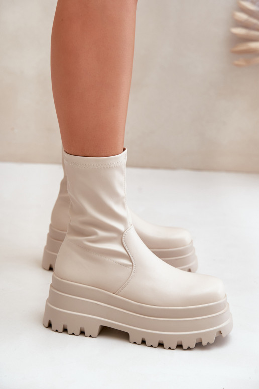 Botas com uma plataforma cor de marfim Florinara Botas com uma plataforma cor de marfim Florinara