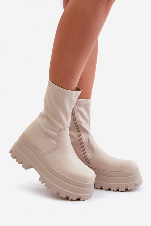 Botas com uma plataforma cor de marfim Florinara Botas com uma plataforma cor de marfim Florinara