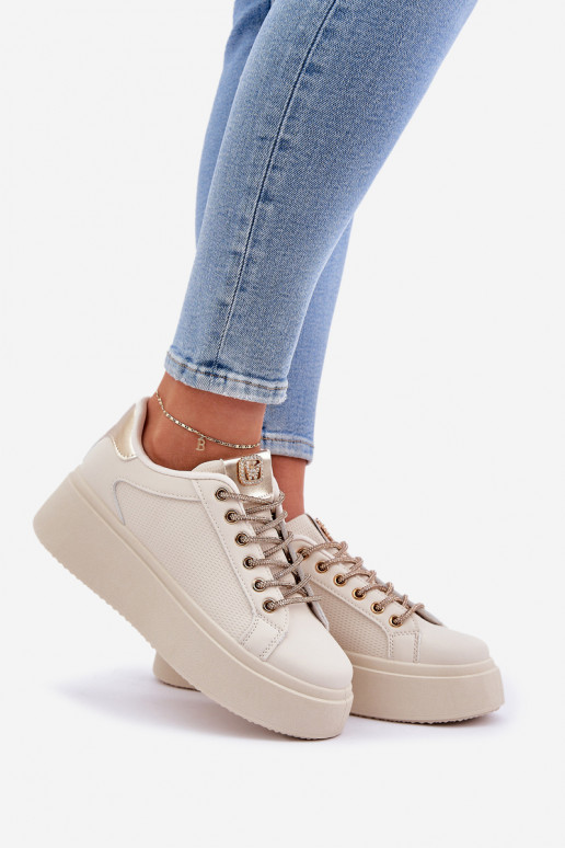 À modalo de tênis com uma plataforma Com decoraçõesi SznuróParakami bege Fonetha À modalo de tênis com uma plataforma Com decoraçõesi SznuróParakami bege Fonetha