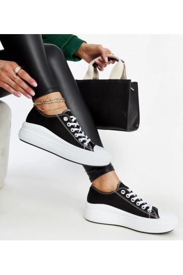 Tênis preto sobre... 2