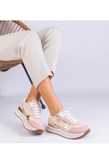 Tênis esportivo rosa sobre...