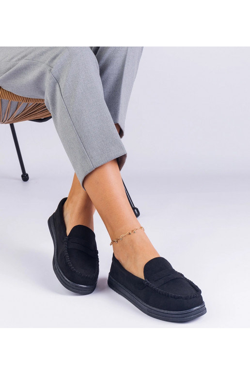 Sapatos femininos pretos de camurça...