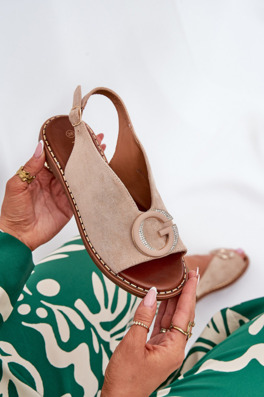 Sandálias rasteiras com enfeites bege Haliones Sandálias rasteiras com enfeites bege Haliones