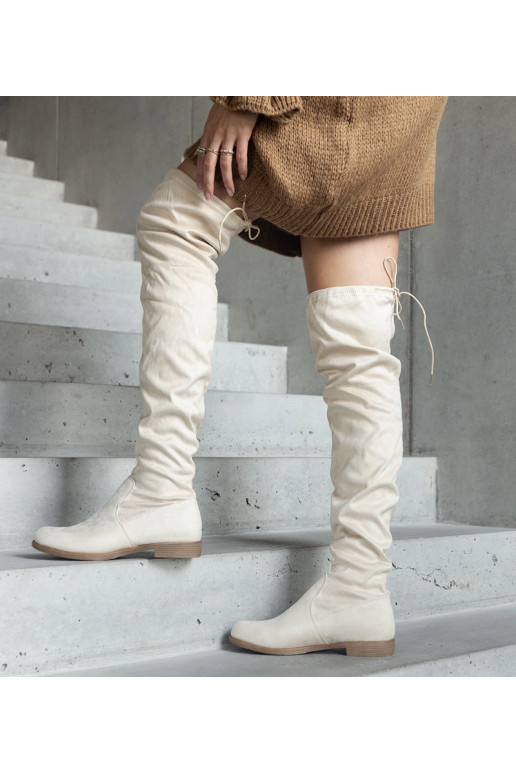 Botas longas bejes com plataforma de...