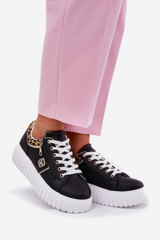 tênis Feminino com uma plataforma de couro ecológico com padrões de pele de leopardo cor preta Velionna