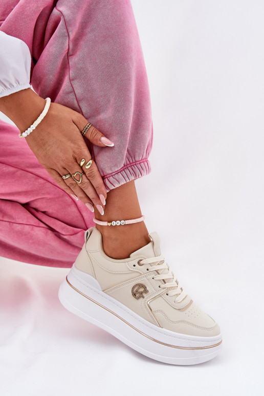 Feminino tênis com uma plataforma bege Caldeno