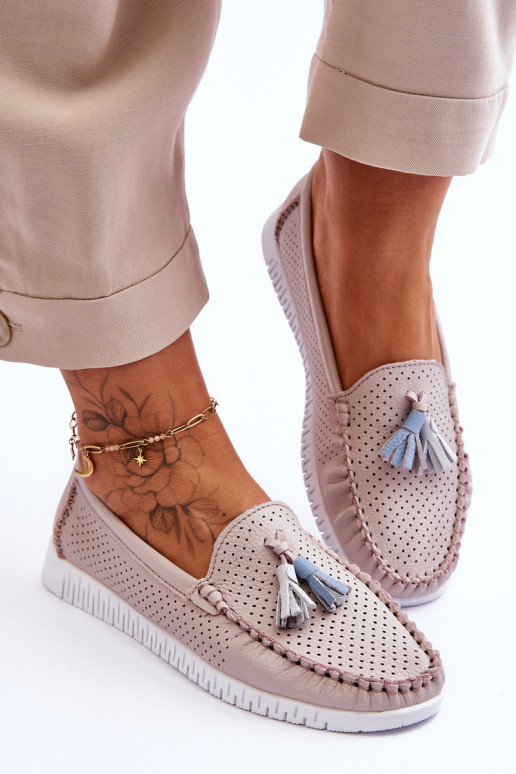 Mocassins de couro com elementos de... Mocassins de couro com elementos de...