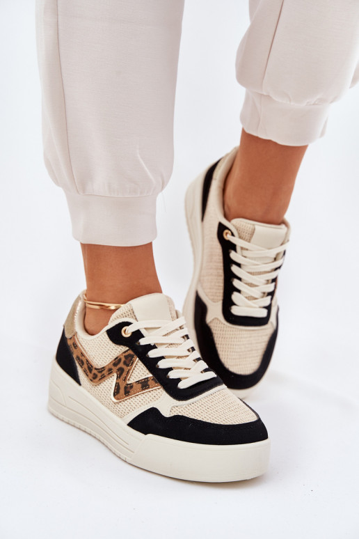 tênis Feminino com uma plataforma com padrões de pele de leopardo cor preta Lorori